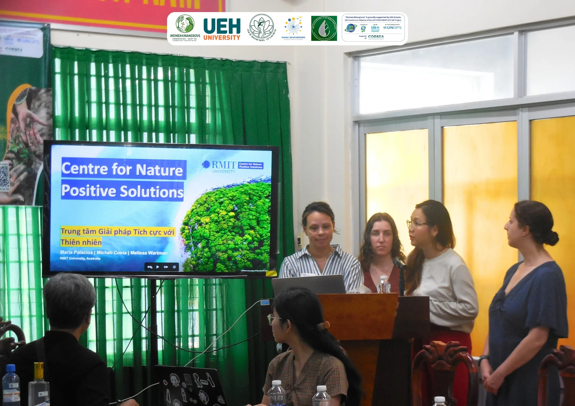 Experts from RMIT University's Centre for Nature Positive Solutions presenting mangrove restoration solutions